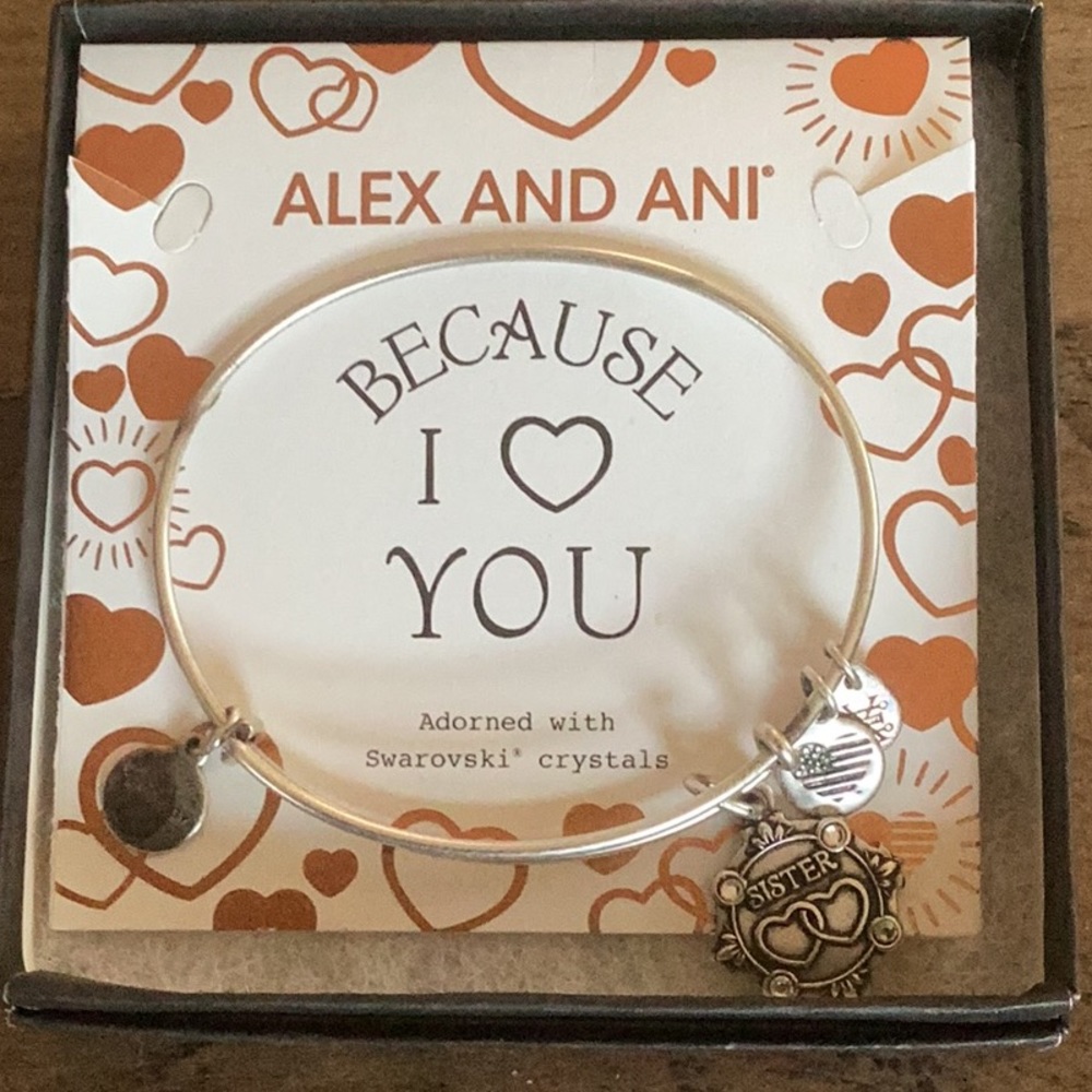 NWOT Alex and Ani sister bracelet in box. Sister charm “Swarovski” crystals.